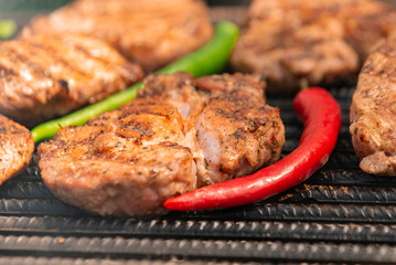 grilled steak with papers jalapeño and chili pepper