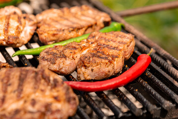 grilled steak with papers jalapeño and chili pepper