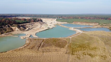 flooded quarry photographed from a drone