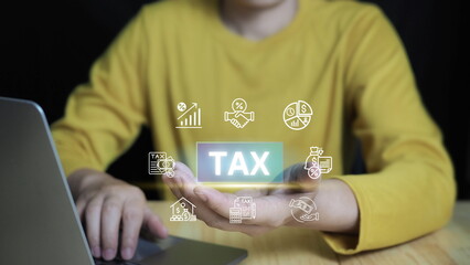 E-tax, Businessman show TAX for Individual income tax return form online for tax payment concept....