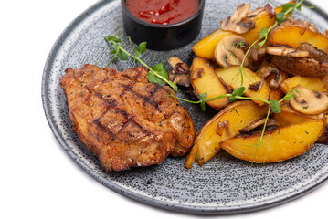 Steak with potatoes and souse