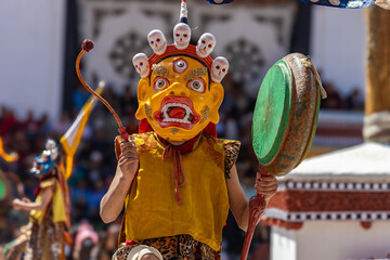 A young Buddhist monk dressed in traditional costume beating drum at Hemis Monastery during Hemis festival at Leh, Ladakh India on 17 June 2024.