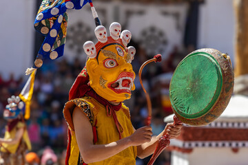 A young Buddhist monk dressed in traditional costume beating drum at Hemis Monastery during Hemis festival at Leh, Ladakh India on 17 June 2024.