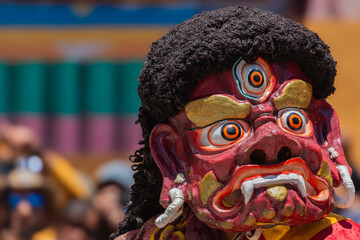 Close up of a colorful mask worn by Buddhist monks during Hemis Monastery festival at Leh, Ladakh India.