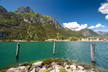 Obraz premium Lake Garda with mountains in background, view from Riva del Garda town shore, Italy, Europe.