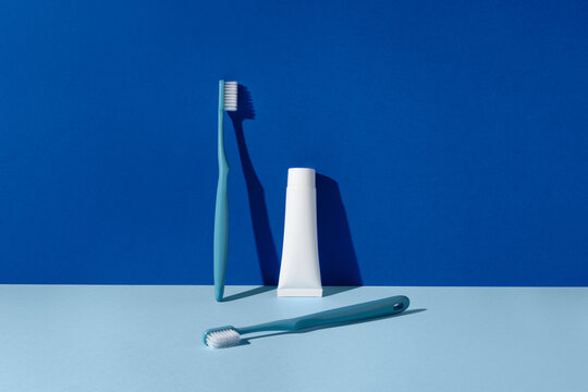 Modern dental hygiene products on a blue background