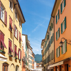 Colorfull buildings in a street of the Riva del Garda, town on the shores of Lake Garda, Italy, Europe.