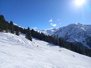 Skiing in austria holiday in mountains with snow