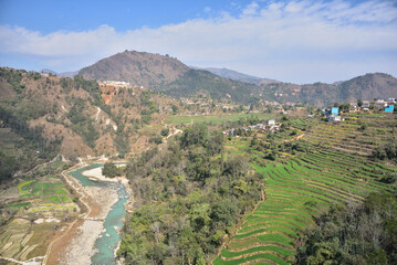 Obraz premium The beautiful view of Aadhi Khola River from Tindobate Pelakot Suspension Bridge