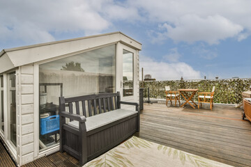 Urban rooftop terrace with cozy patio furniture