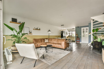 Stylish and modern living room interior with natural light