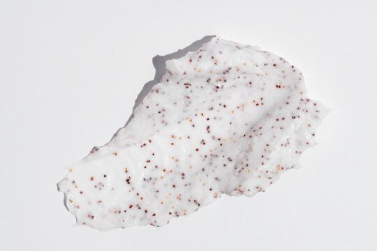 Exfoliating cream smear with scrub particles