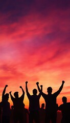 Silhouetted group of people celebrating under a vibrant sunset sky, expressing unity and joy during a beautiful evening outdoors.