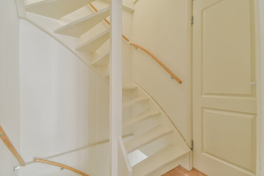 Modern white staircase in a minimalist interior design