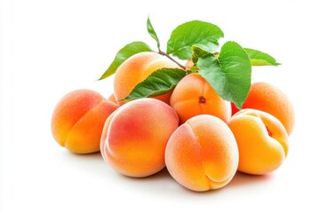 Fresh apricots with green leaves on white background