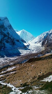 Aerial footage of huge glacier and mountains on the way to Dharamsala village, Nepal, Himalayas