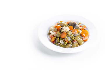 Menestra de verduras or Spanish vegetable stew isolated on white background. Copy space