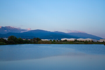 Landscape with a pond and mountains. Sirius (Adler) Sochi.