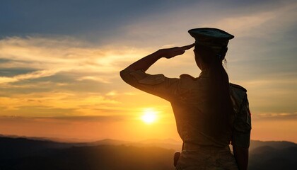 The silhouette of a soldier saluting at sunset, symbolizing respect, military honor, and patriotism against a peaceful evening sky