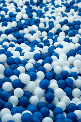 blue and white plastic balls or Ocean ball background.