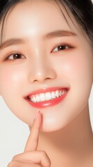 Obraz premium Beautiful smile of young woman with healthy white teeth