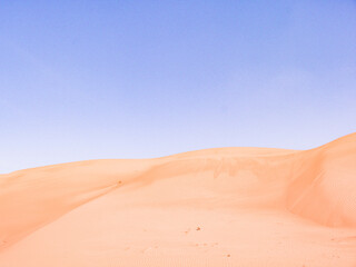 Sand Dunes in Oman Desert against blue sky, Middle East