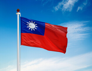 Taiwan flag waving in the wind with blue sky background