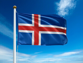 The flag of Iceland fluttering in the wind with blue sky background