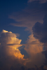 
It's an atmospheric sunset sky with big clouds.