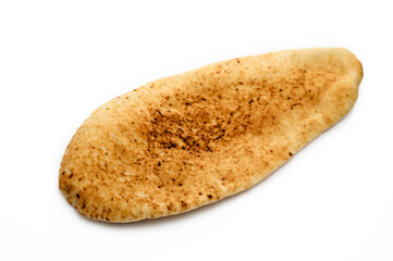 Fresh pita bread close up isolated on white background