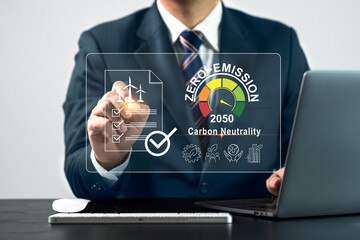 Platform for trading renewable energy certificates. Businessman using computer and virtual screen. Concept of renewable energy use and renewable energy trading on user-friendly platform.