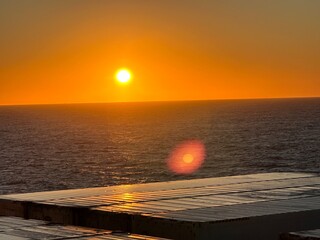 sunset in the middle of ocean 