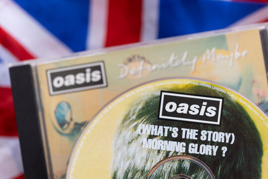 London, UK - August 27 2024: Oasis band cds. Oasis are a popular rock band from the 1990's britpop era