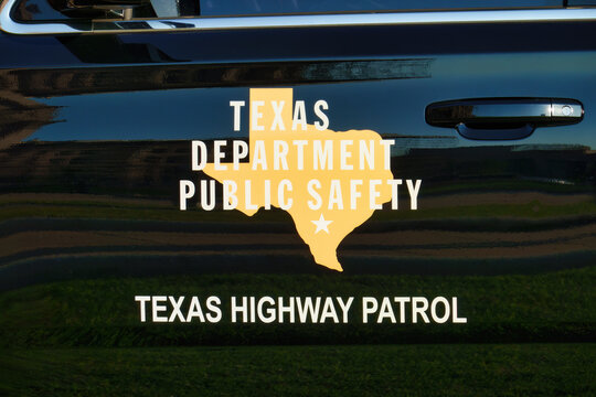 AUSTIN, TEXAS, USA - AUGUST 9, 2024: Texas Highway Patrol, division of the Texas Department of Public Safety. Logo, door seal on State Trooper vehicle in Austin, Texas, USA.