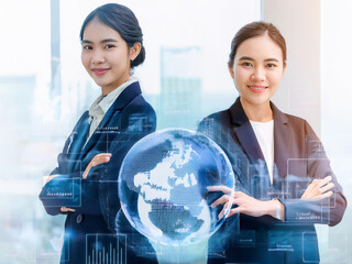 Global Business Technology Concept with Two Confident Asian Female Professionals