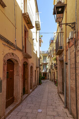 Obraz premium A street between old houses of Isernia, a city in Molise, Italy.