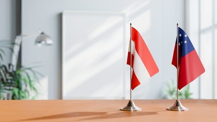 FLAGS OF AUSTRIA AND SAMOA ON TABLE