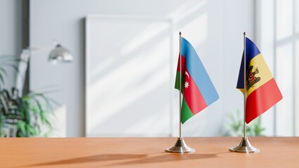 FLAGS OF AZERBAIJAN AND MOLDOVA ON TABLE