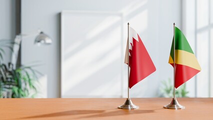 FLAGS OF BAHRAIN AND CONGO REPUBLIC ON TABLE