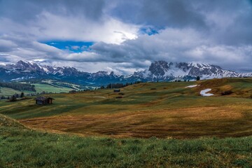 Panoramic view from the Seiser Alm to the Dolomites in South Tyrol, Italy.