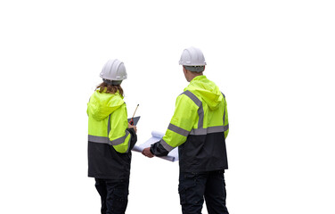 Engineers wearing safety gear, including hard hats examining survey a tablet standing industrial...