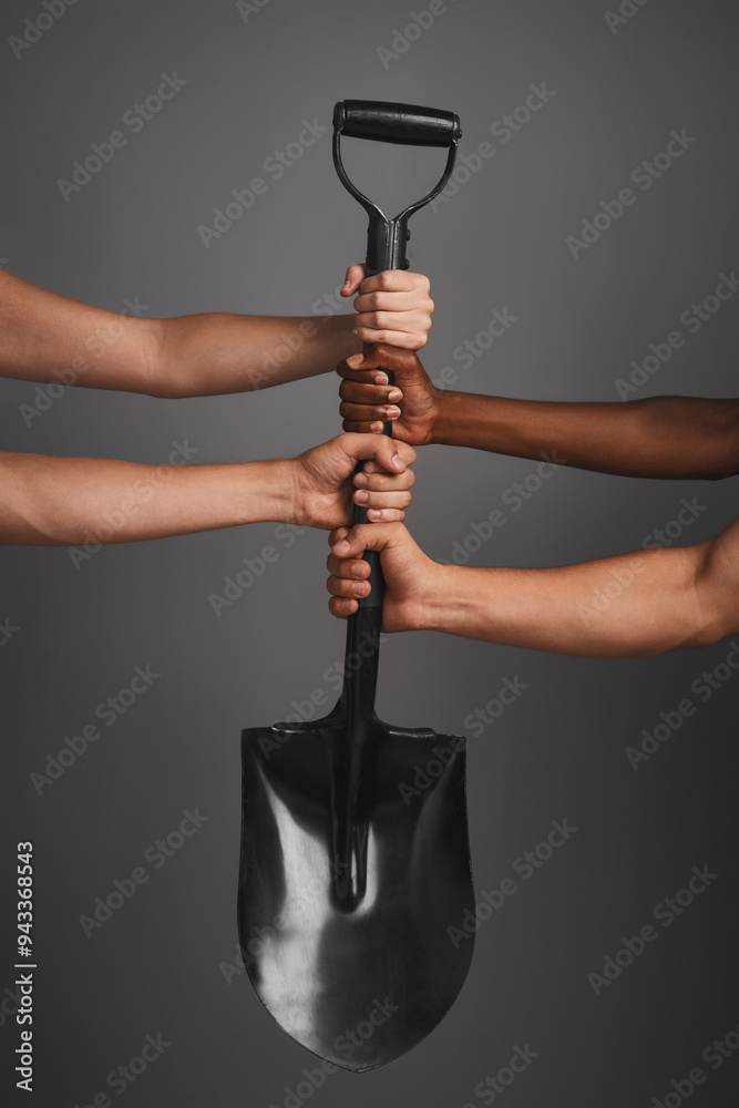 Poster holding spade, people and group with hands, lay foundation and team building on gray studio backgrou