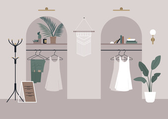 A chic fashion store interior features two archways adorned with beautiful dresses and leafy plants, creating a serene shopping atmosphere filled with style and elegance