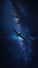 Single airplane navigating through starry blue night sky