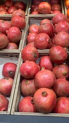Baskets of fresh tropical pomegranate fruits
