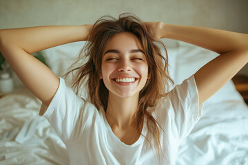 Fototapeta premium Morning Beautiful woman, full of happiness, stretched out on the bed in the morning after a sound sleep.