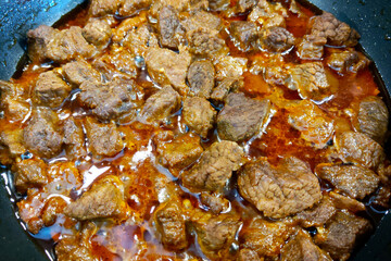 Savory Beef Stew in Simmering Sauce - Perfect for Comfort Food Lovers and Culinary Creations