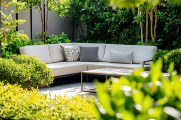 Fototapeta premium White Sectional Sofa with Pillows in a Lush Garden