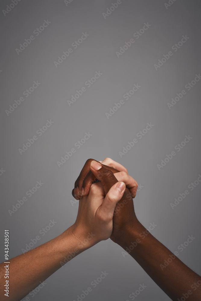 Poster hands, holding and studio for support or unity, together and symbol of solidarity on gray background