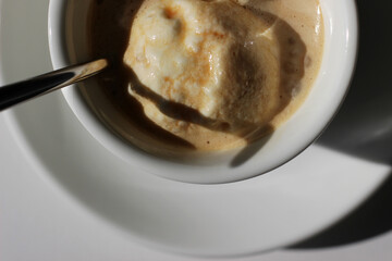 Affogato Coffee Closeup. Cup of Espresso with Vanilla Ice Cream.